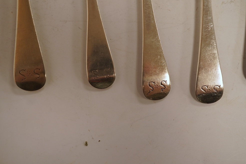 A group of twelve assorted Georgian silver base mark rat tail teaspoons, various dates and makers, indistinct marks, 4.4oz.